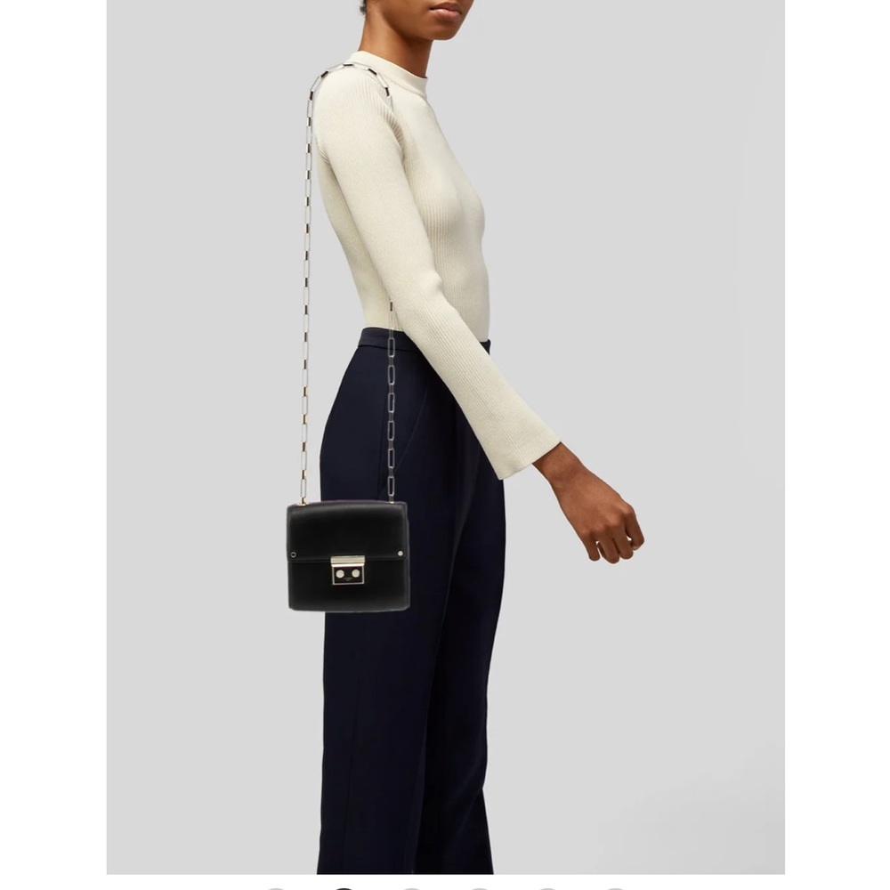 Luana Italy leather crossbody bag with gold chain.